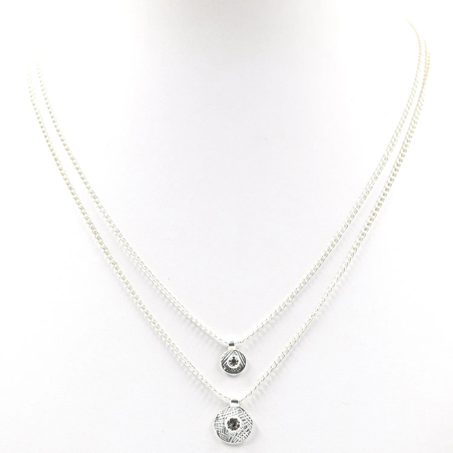 Double strand matt silver necklace with crystal pendants