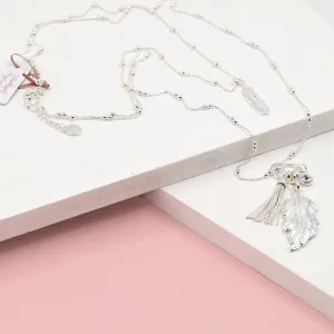 Feather and tassel pendants on long ball chain