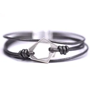 Geometric cut out shapes on multi leather bracelet