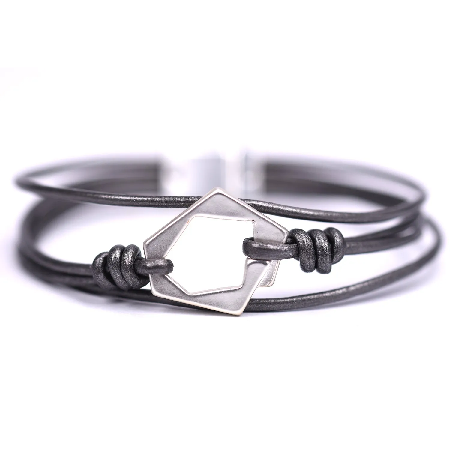 Geometric cut out shapes on multi leather bracelet
